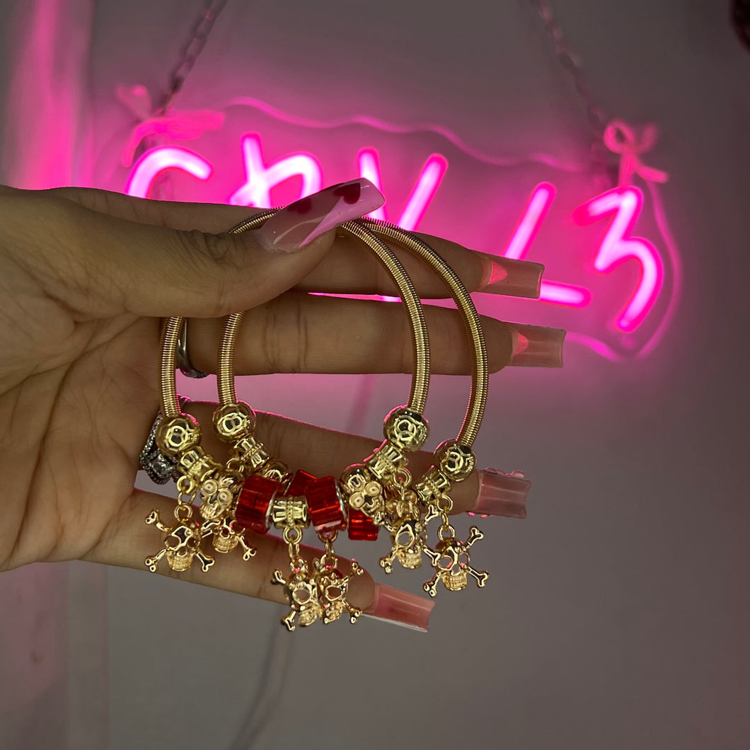 Gold & Red Skull Spring Charm Bracelet